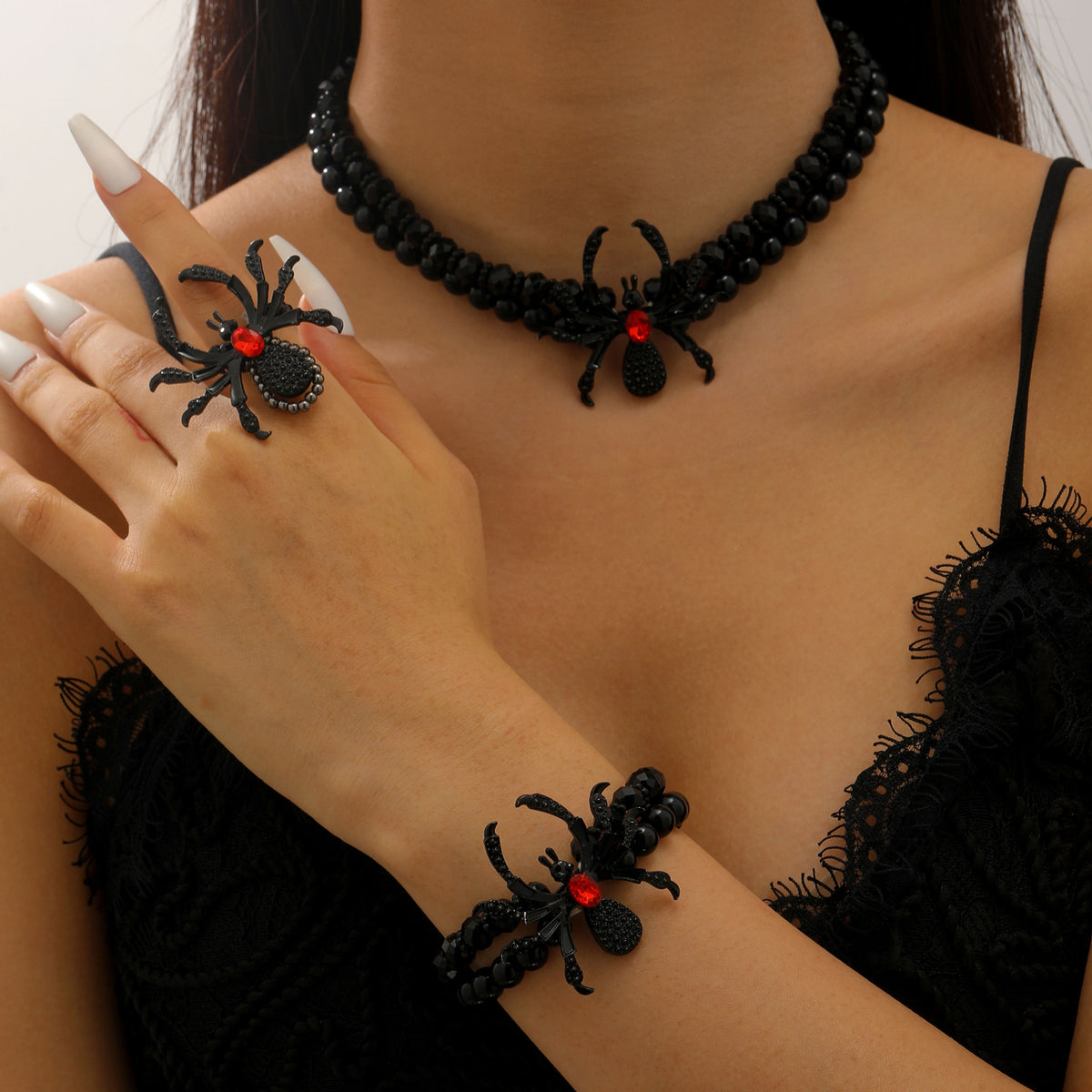 Asta – Dreiteiliges Set mit Spinnenmotiv
